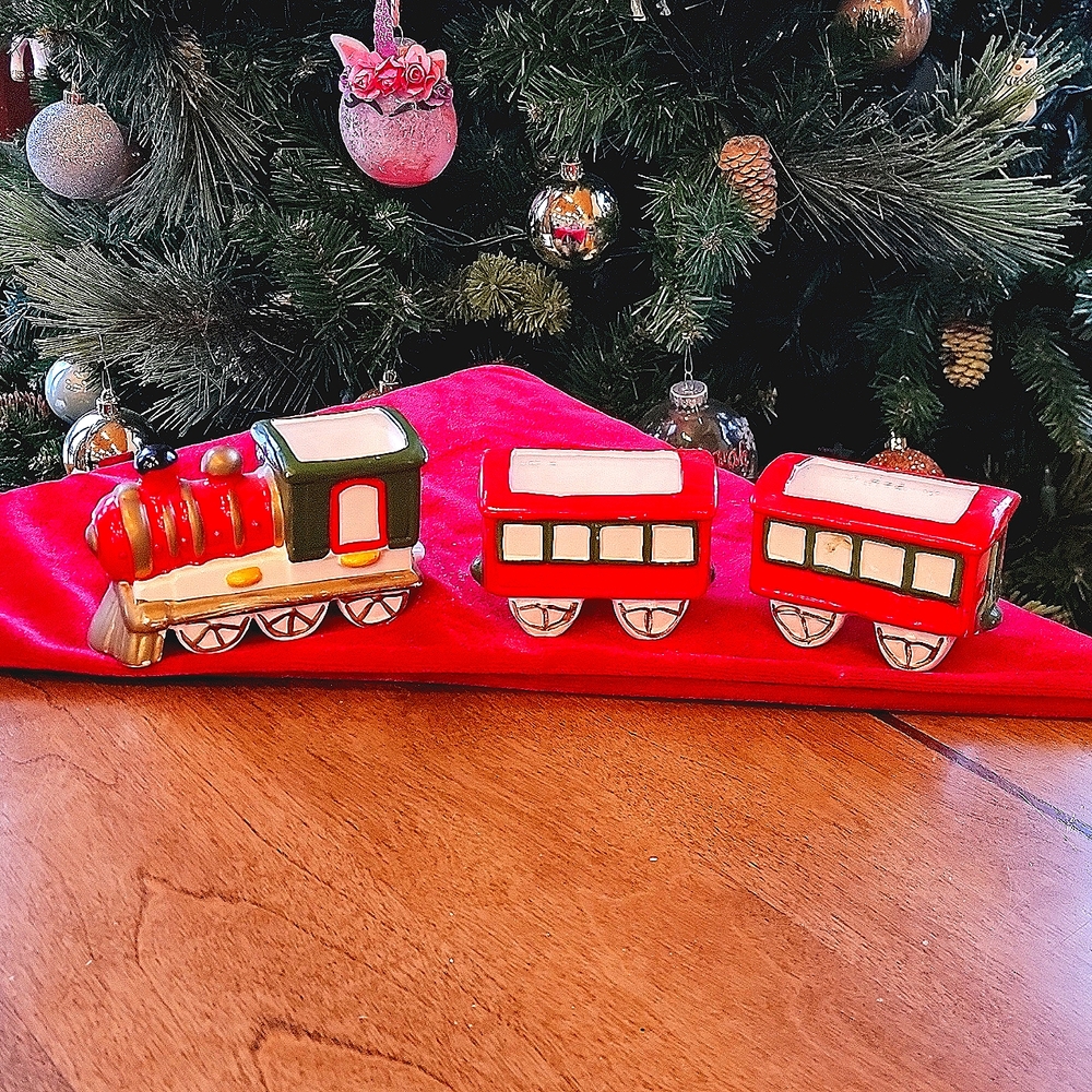 Three piece ceramic train Christmas ornaments.